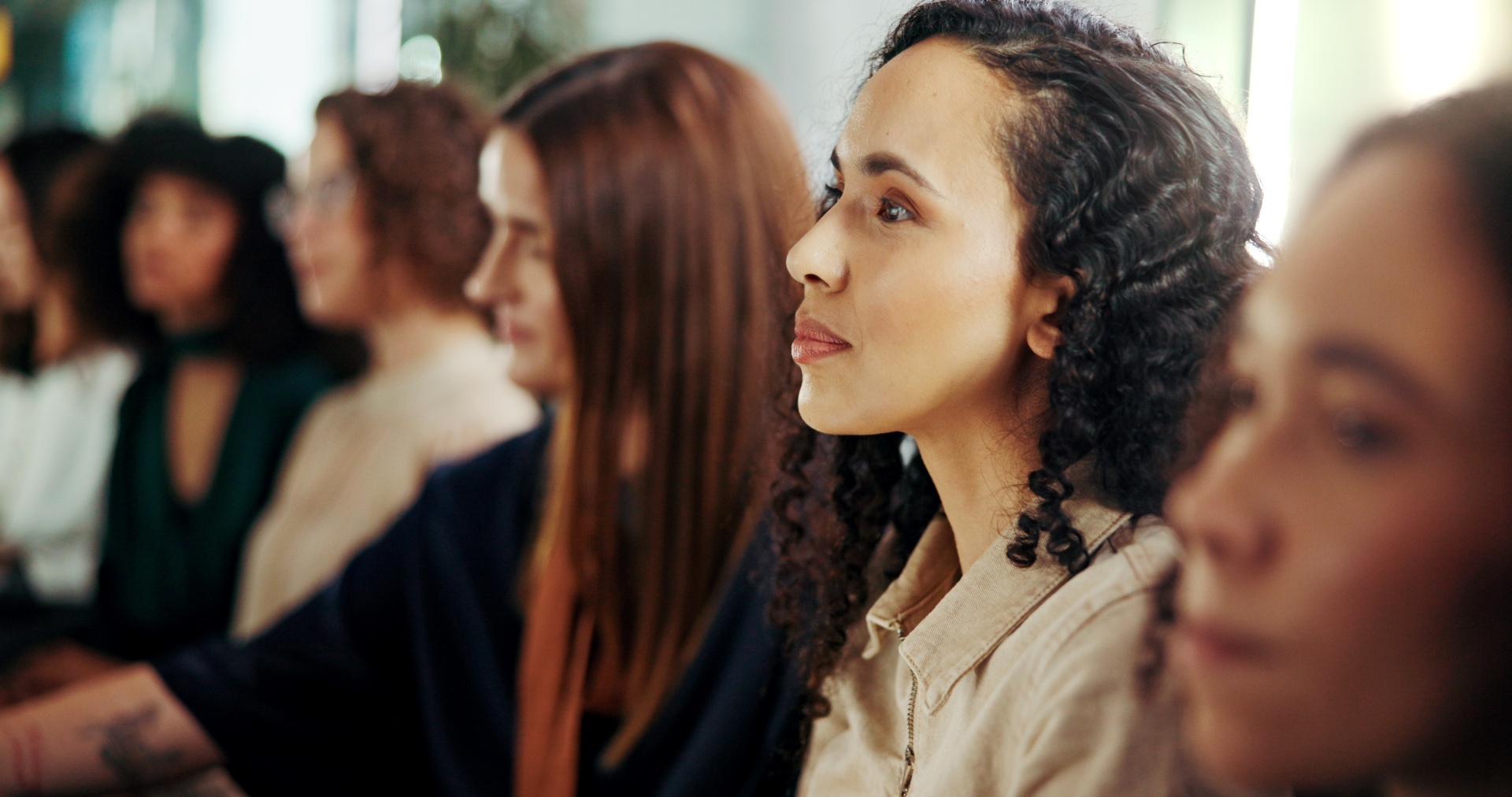 Women gathered together in a supportive circle.
